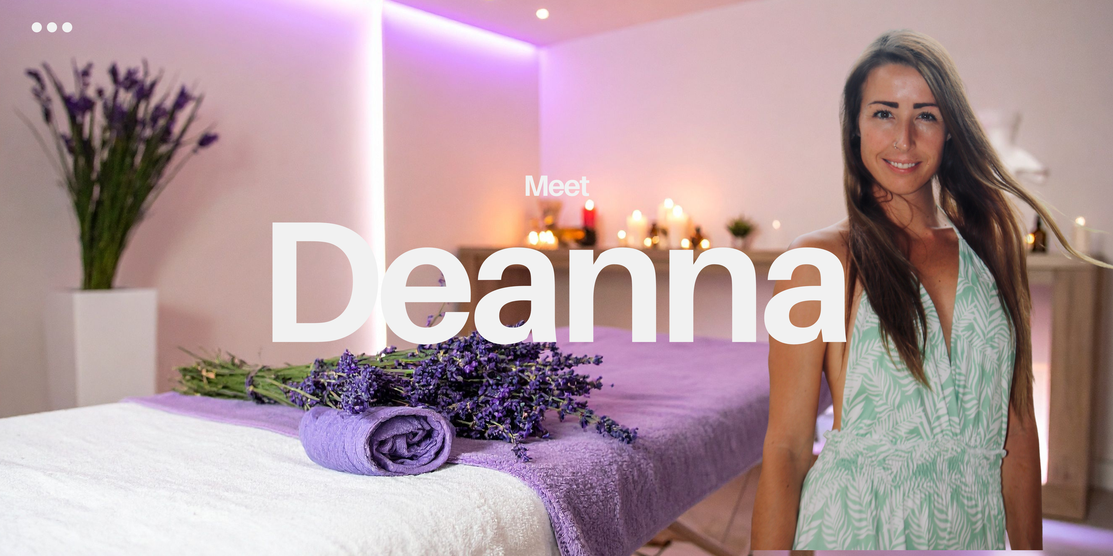 Woman standing next to a bed with lavender flowers, introducing herself as Deanna.