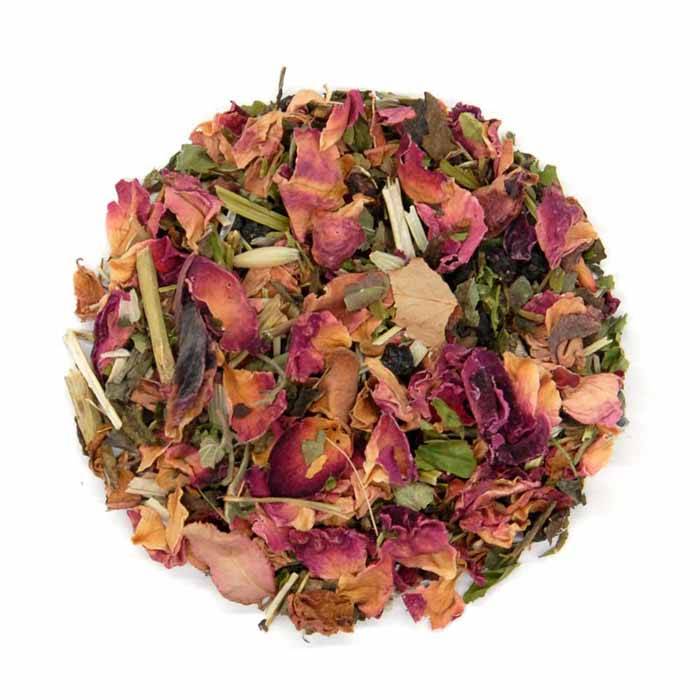 Colorful mix of dried flowers and herbs on a white background