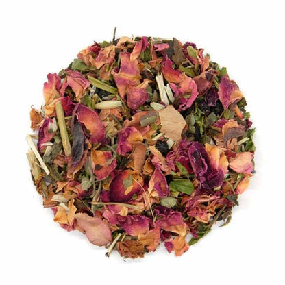 Colorful mix of dried flowers and herbs on a white background