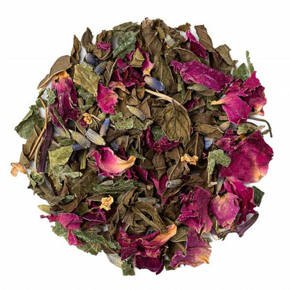 Tea leaves with pink flowers on a white background